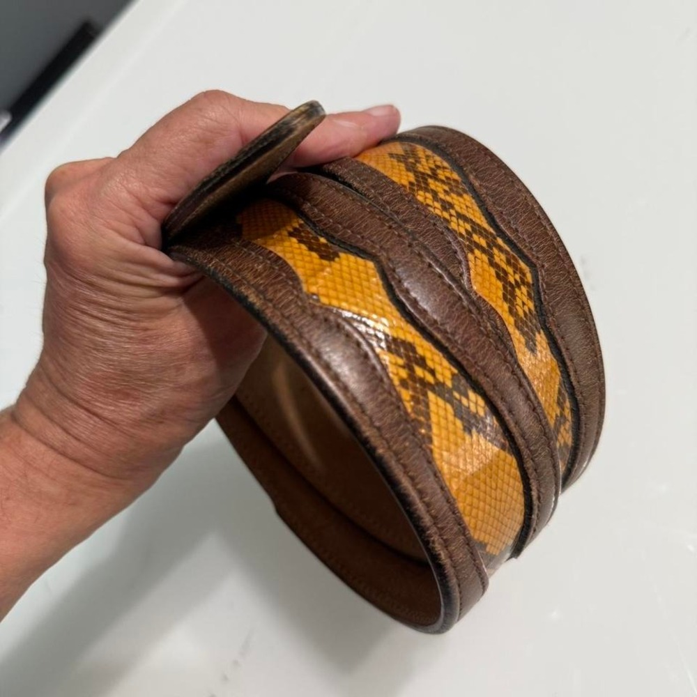 Brown leather and python belt with a‎ unique design